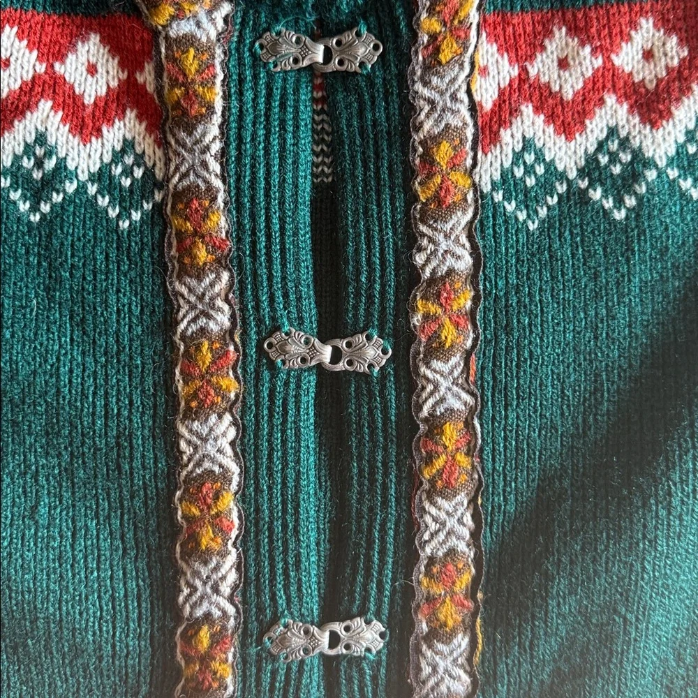 This is a vintage 90s Eddie Bauer Nordic wool blend cardigan sweater in green